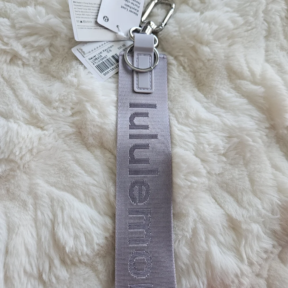 NWT Never Lost Keychain Faint Lavender/Grape Mist